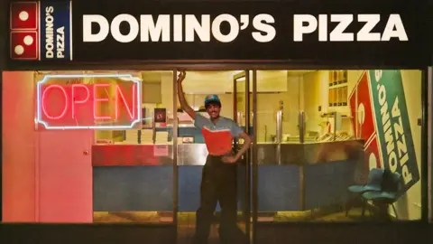 Domino's Pizza Domino's came to the UK in 1985, with the first store opening in Luton