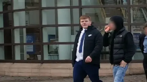 Brett Woodhouse leaves court