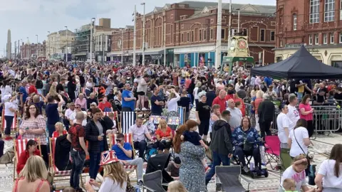 Crowds in Blackpool on deck chairs
