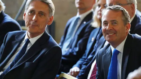 Reuters Philip Hammond and Liam Fox