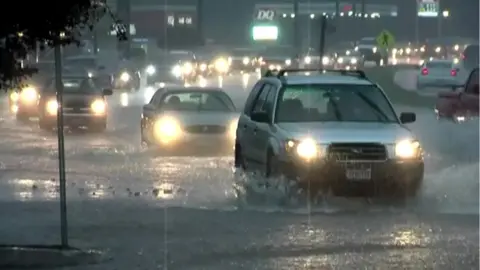 EVN Image shows cars travelling through flooded roads