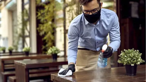 Getty Images A waiter