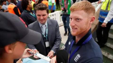 Reuters Ben Stokes signing autographs