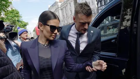 PA Media Jamie and Rebekah Vardy outside the High Court