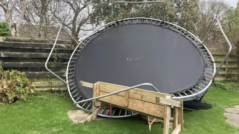 Ianto Price Jones Trampoline blown over