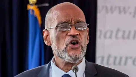 Getty Images Ariel Henry speaks during a ceremony as he takes office as Prime Minister of Haiti, Port-au-Prince, 20 July 2021