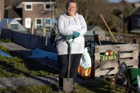 Nat Wilkins Debra Cleary in her allotment