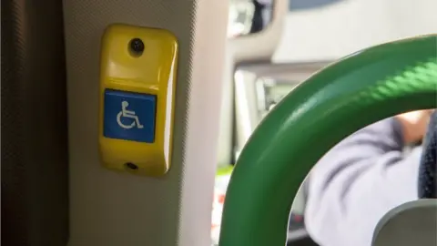 Getty Images A disabled button on a bus