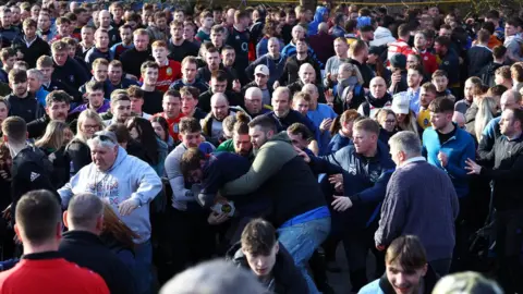 Molly Darlington/Reuters Ashbourne Shrovetide football