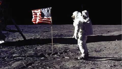 AFP/Getty Images This NASA file photo taken on July 20, 1969 shows astronaut Edwin E. "Buzz" Aldrin, Jr. saluting the US flag on the surface of the Moon