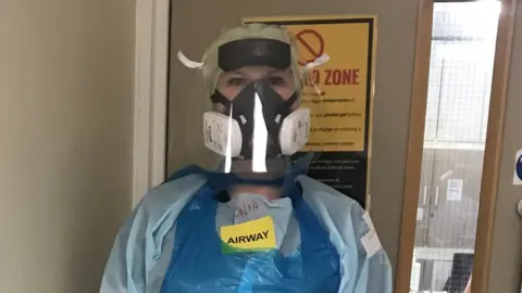 Family photo Dr Sonya Daniel in PPE