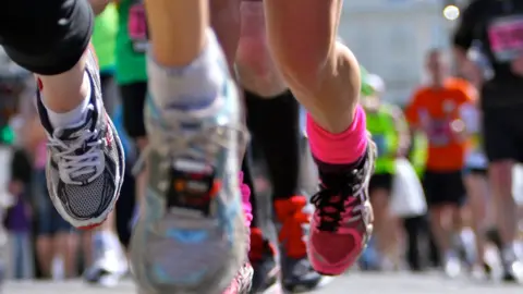 Getty Images feet in trainers running