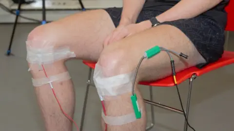 Lancaster University Microphones are attached to the knees to pick up high-frequency noises