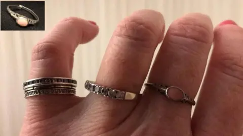 Ness Johnson Image of rings on Ness Johnson's fingers