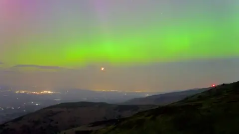 PROFESSORMILLER/ WATCHERS BBC Weather Watcher Professormiller captured green hues in the sky over Mold, Flintshire
