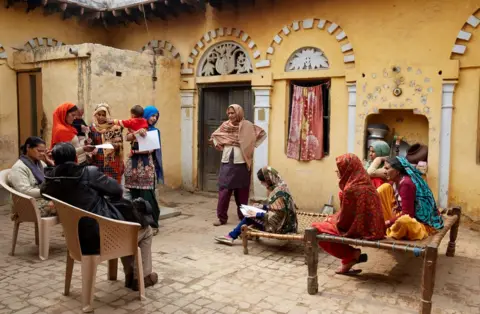 BBC Members of Action India and some of the factory workers