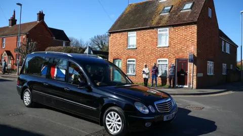 Reuters Captain Sir Tom Moore's funeral was driven through the village of Marston Moretaine.