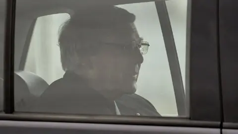 AFP/Getty Images Cardinal George Pell in a car leaving Victoria's Barwon Jail after his child abuse convictions were overturned