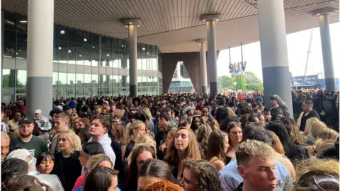 Fans queuing