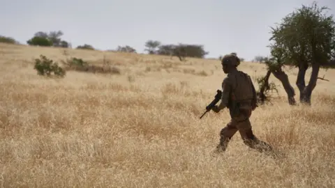 AFP A solider in northern Burkina Faso in 2019.