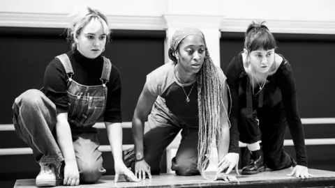 Matt Humphrey MACBETH in rehearsals. Lola Shalam (Third Witch), Danielle Fiamanya (Second Witch) and Lucy Mangan (First Witch)