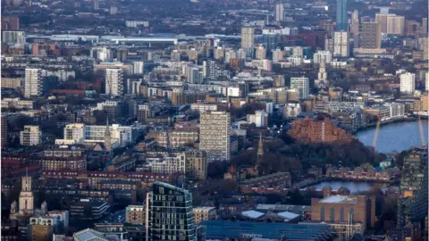 Getty Images Apartment buildings and offices in the Tower Hamlets borough in London