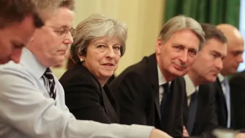 AFP Theresa May, Philip Hammond and other cabinet ministers