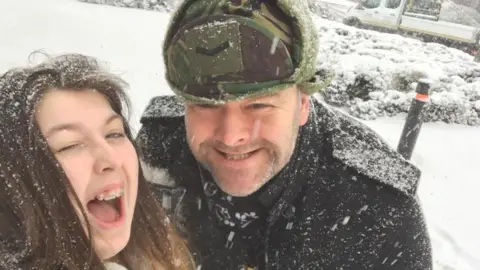 Ella Gandan  Ella and her father in the snow