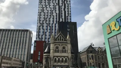 A student accommodation tower behind the Chapel