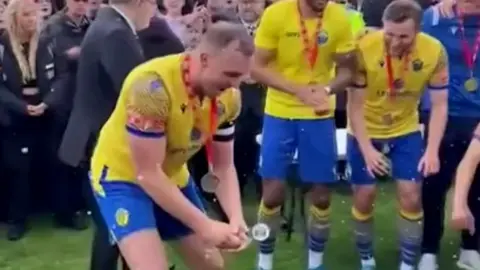 Warrington Town players celebrate