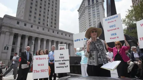 Getty Images Bernard Madoff fraud victims hold a news conference following the sentencing hearing for Madofff, who was convicted for running a multibillion-dollar ponzi scheme, at Federal District Court in Manhattan on June 29, 2009 in New York City.