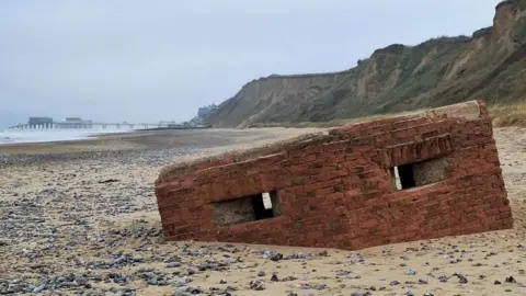 Watch keeper Kate/NCI World War Two pillbox, East Runton beach, Norfolk