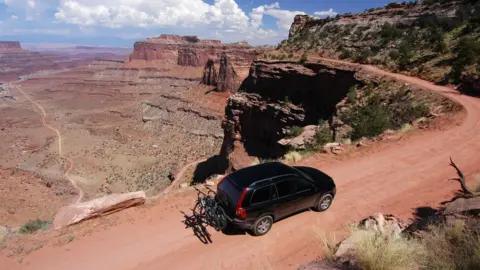 Getty Images SUV driving along Grand Canyon road