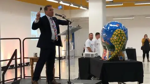 Christopher Quevatre Elephant being auctioned