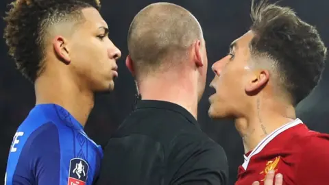 Mason Holgate and Roberto Firmino