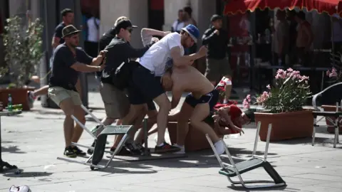 Getty Images Fans fight in Marseille