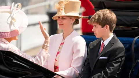 PA Media Viscount Severn and Lady Louise Windsor ride in a carriage as the Royal Procession leaves Buckingham Palace for the Trooping the Colour ceremony at Horse Guards Parade