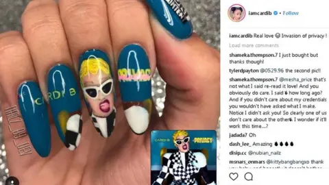 Cardi B/ Instagram A manicure featuring Invasion of Privacy artwork