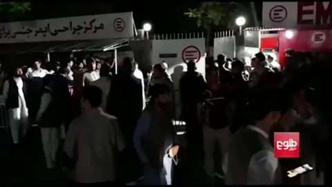 TOLO News People gathered outside a hospital