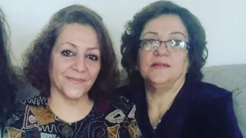 Nazanin Aghlani Sisters Fatima Afrasiabi (left) and Sakineh Afrasehabi