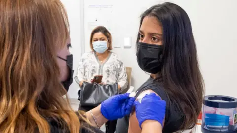 Getty Images 16-year-old getting a jab