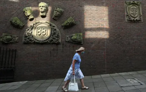 Reuters A woman walks through Prudhoe Chare