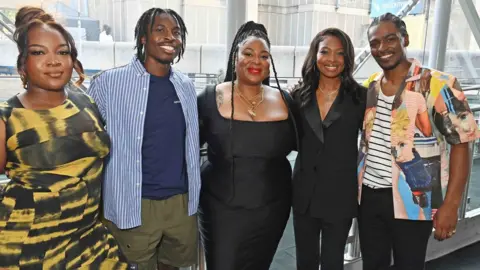 Getty Images Champion singer and actress Ray BLK, director John Ogunmuyiwa, writer Candice Carty-Williams, actress Deja J Bowens and actor Malcolm Kamulete