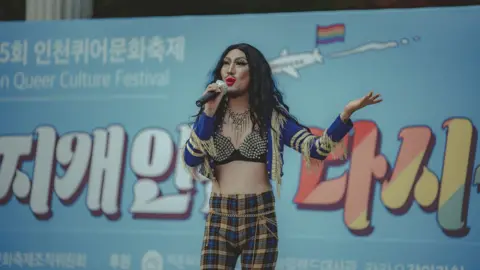 Incheon Queer Culture Festival Hurricane Kimchi speaking at 2022 Incheon Queer Culture Festival