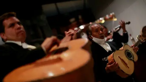 Reuters A Mariachi group play music which will be shown online for Mother's Day in Mexico City, Mexico, May 9, 2020