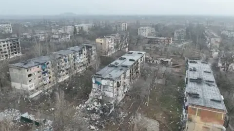 Reuters Damaged buildings in Vuhledar, eastern Ukraine. Photo: January 2023