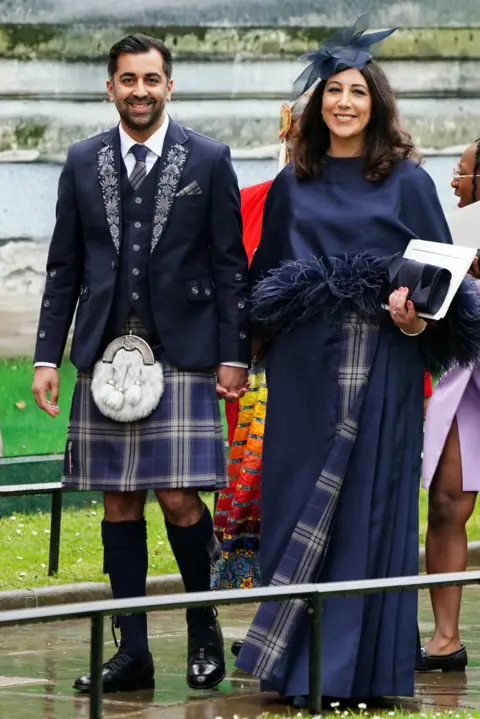 PA Media First Minister Humza Yousaf and his wife Nadia El-Nakla