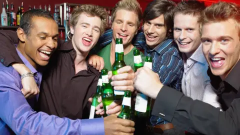 Getty Images Young men drinking