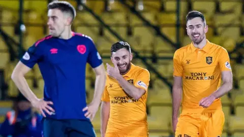 Livingston's Ryan Hardie (right) celebrates his second goal with teammate Steven Lawless