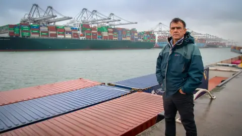 Tim Jones/BBC The port at Rotterdam, where much of the food imported from Wales arrives